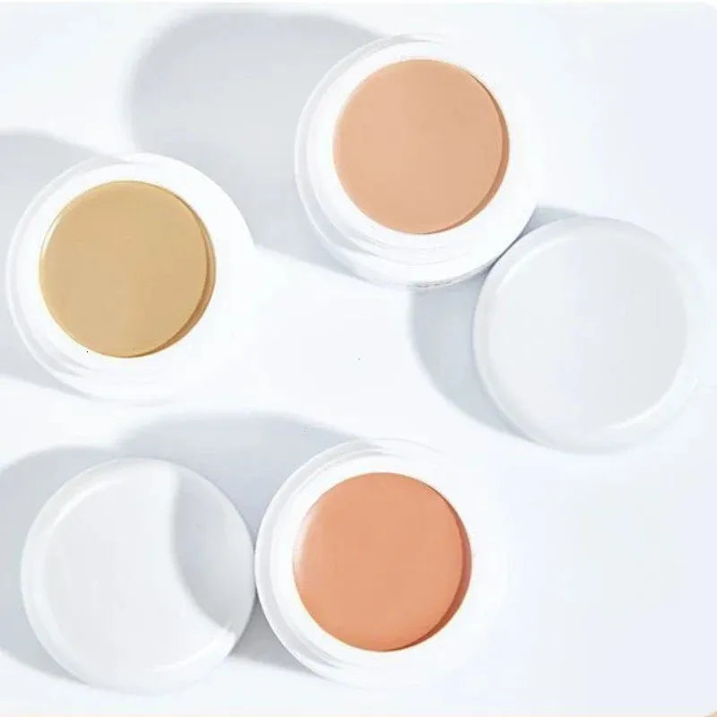 Swatches of concealer shades on skin showing color range