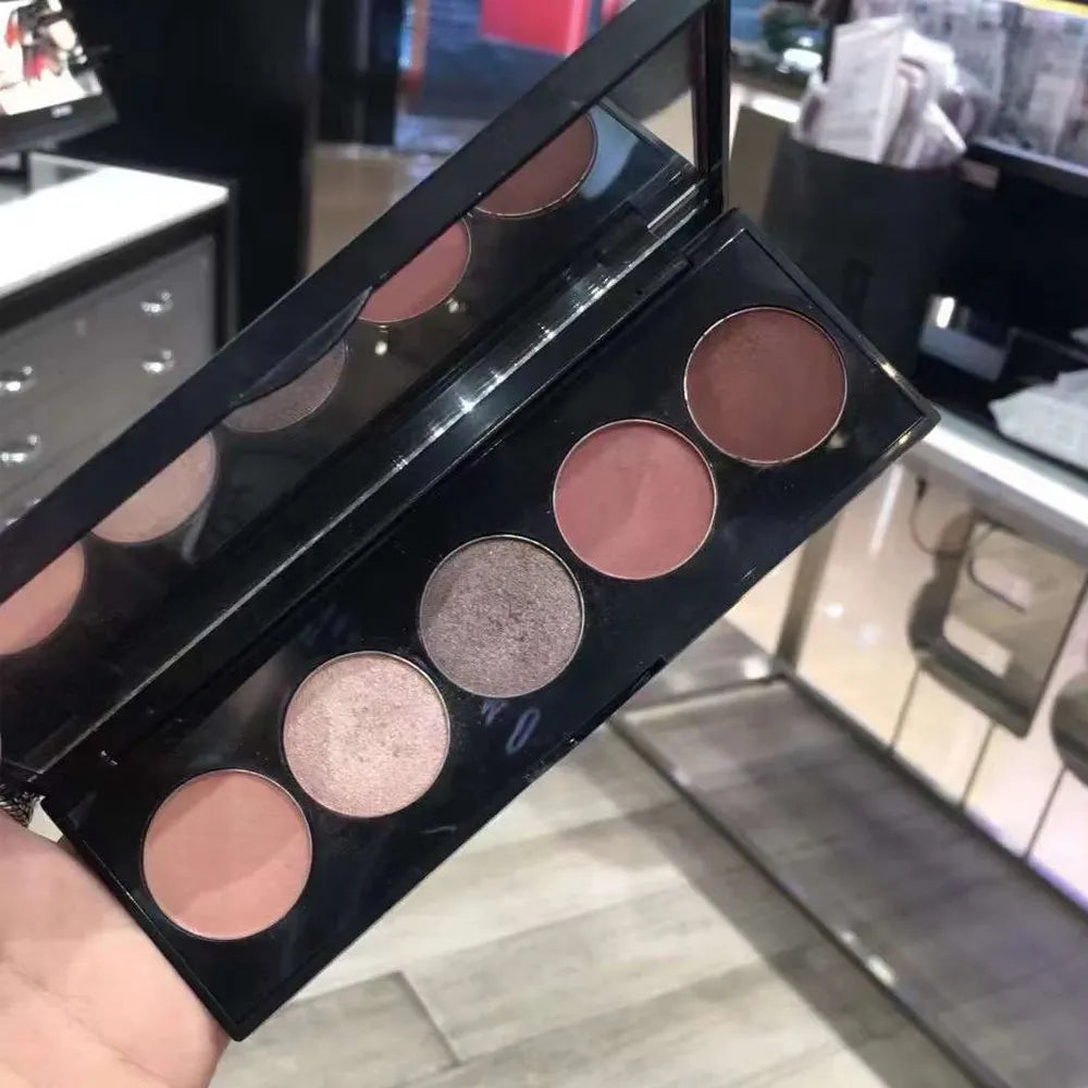 Five-color smokey nudes eyeshadow palette open with shades visible