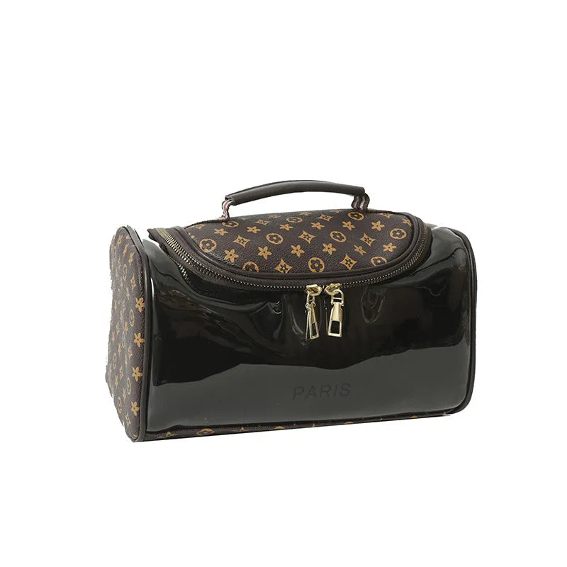 Makeup bag open showing compartments for lipstick and eyebrow pencils