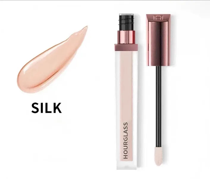 Close-up view of concealer stick showing smooth texture and applicator tip