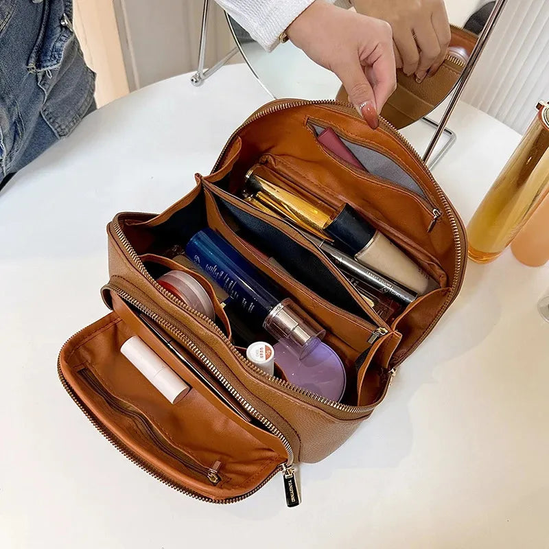 Interior view of makeup bag showing multiple compartments for organization