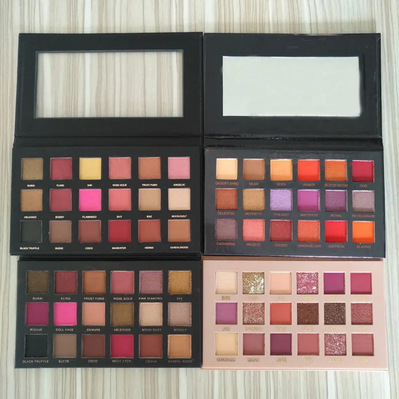 Close-up view of eyeshadow palette with color swatches displayed