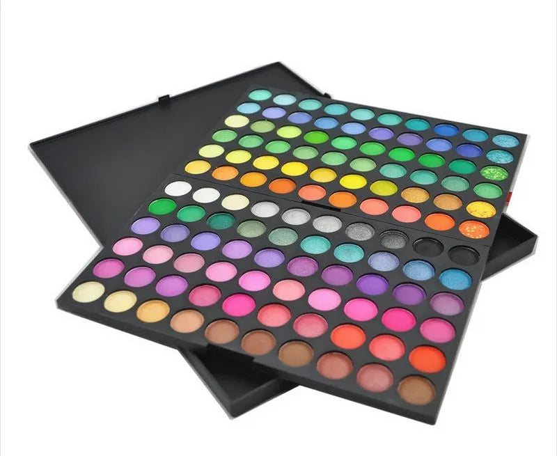 Makeup palette with color swatches demonstrating the range of eyeshadow and blusher options