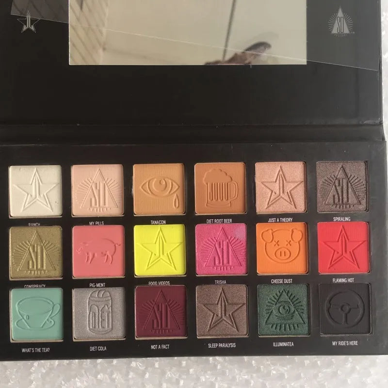 Close-up view of eyeshadow palette with matte and shimmer finishes