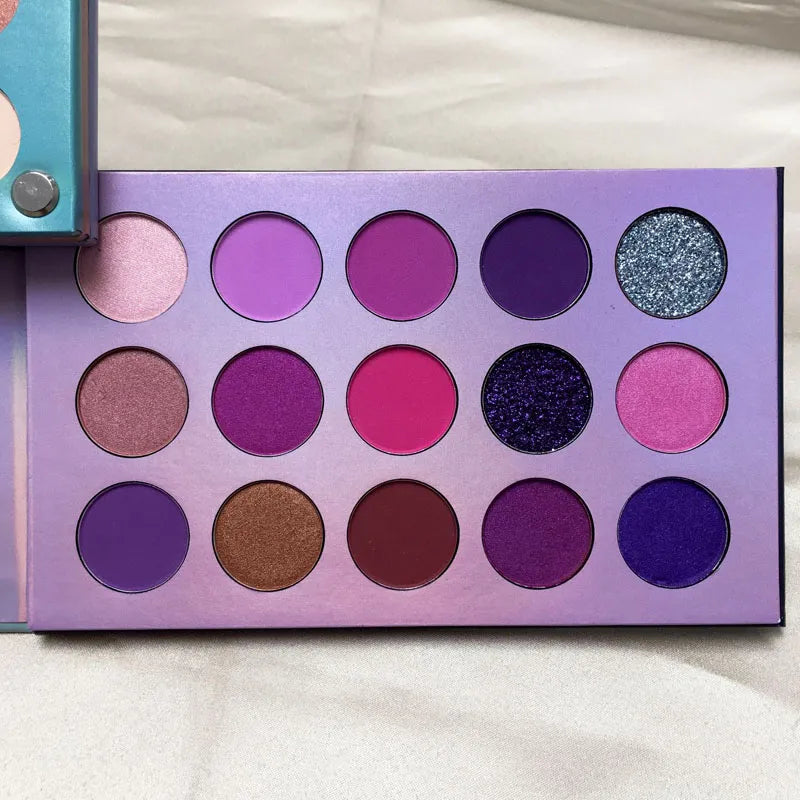Close-up view of eyeshadow palette with glitter and nude color options