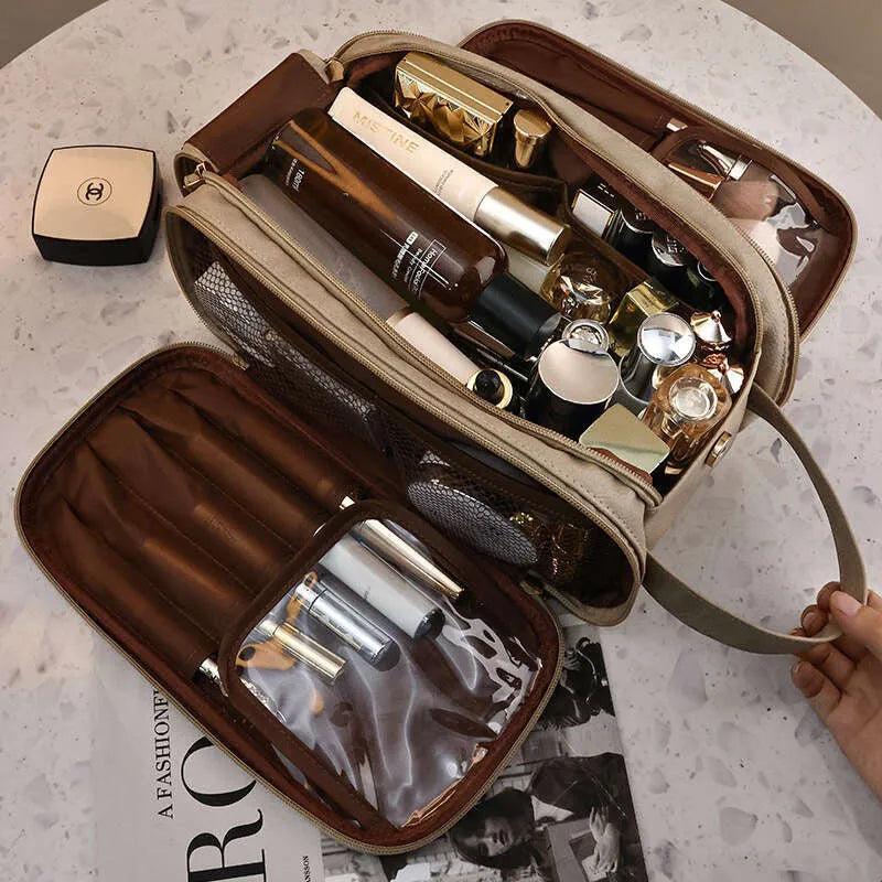 Multi-compartment makeup bag with open compartments showing interior organization