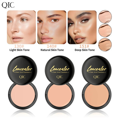 Close-up of makeup applicator with concealer product
