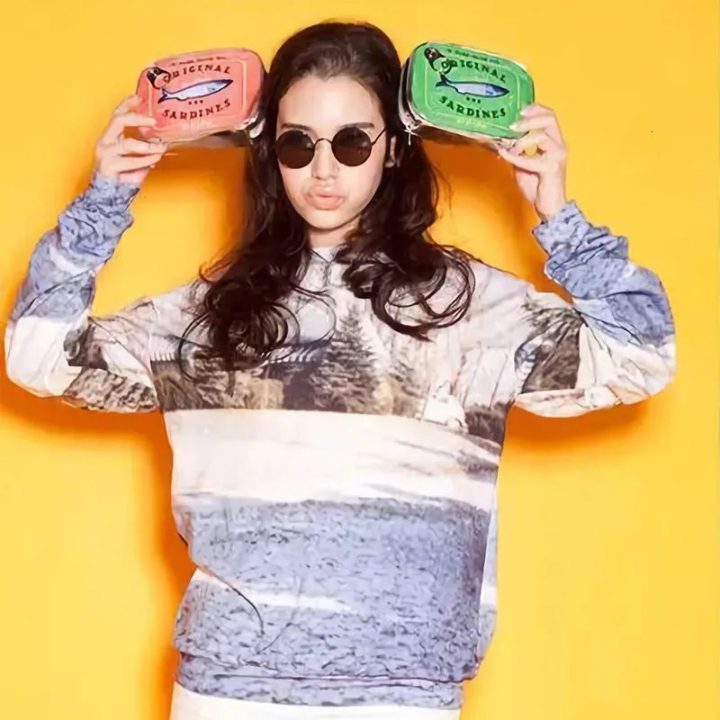 Cosmetic bag held in hand to demonstrate portability