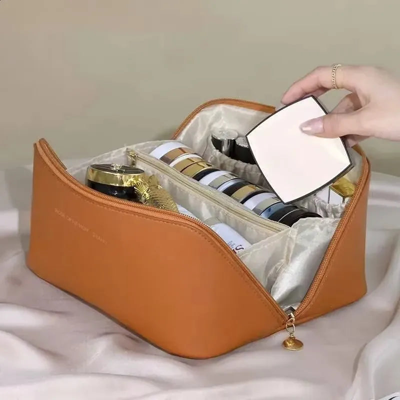 Open cosmetic organizer displaying interior compartments and pockets