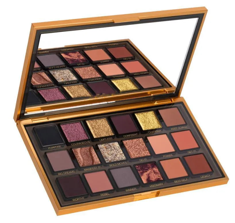 Open eyeshadow palette showing 18 colors in shimmer and matte finishes