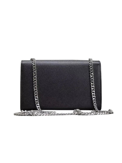 Close-up detail of optional tassel accent on cosmetic bag