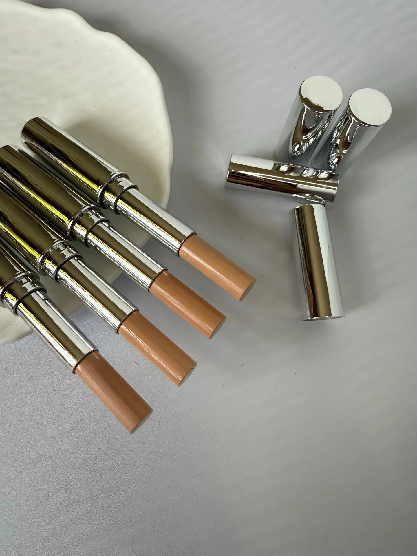 Cream finish concealer stick in closed position showing packaging