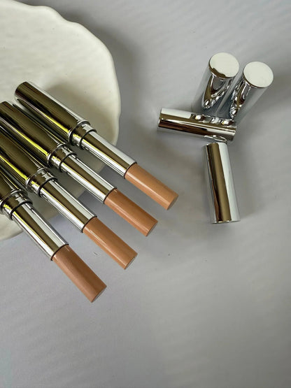 Cream finish concealer stick in closed position showing packaging