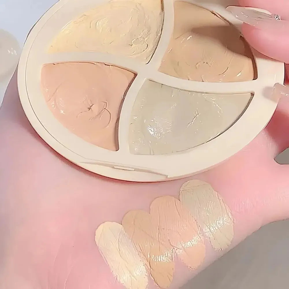 Close-up view of concealer palette with different options for complexion correction