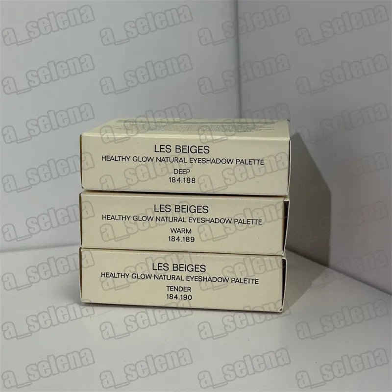 Four matte eyeshadow shades in warm colors displayed in a palette