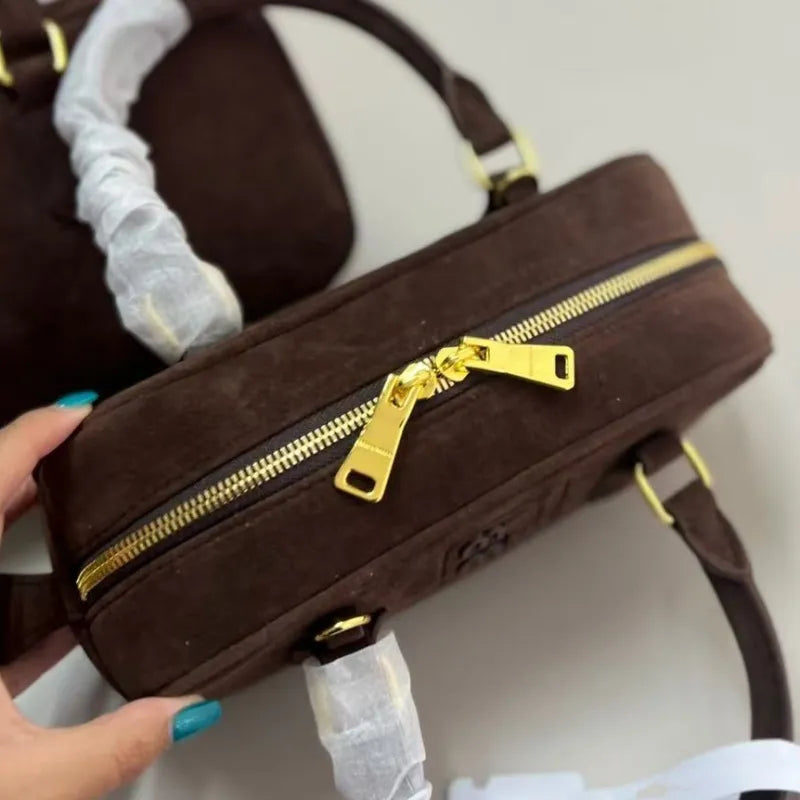 Interior view of the handbag showing spacious compartments for organization