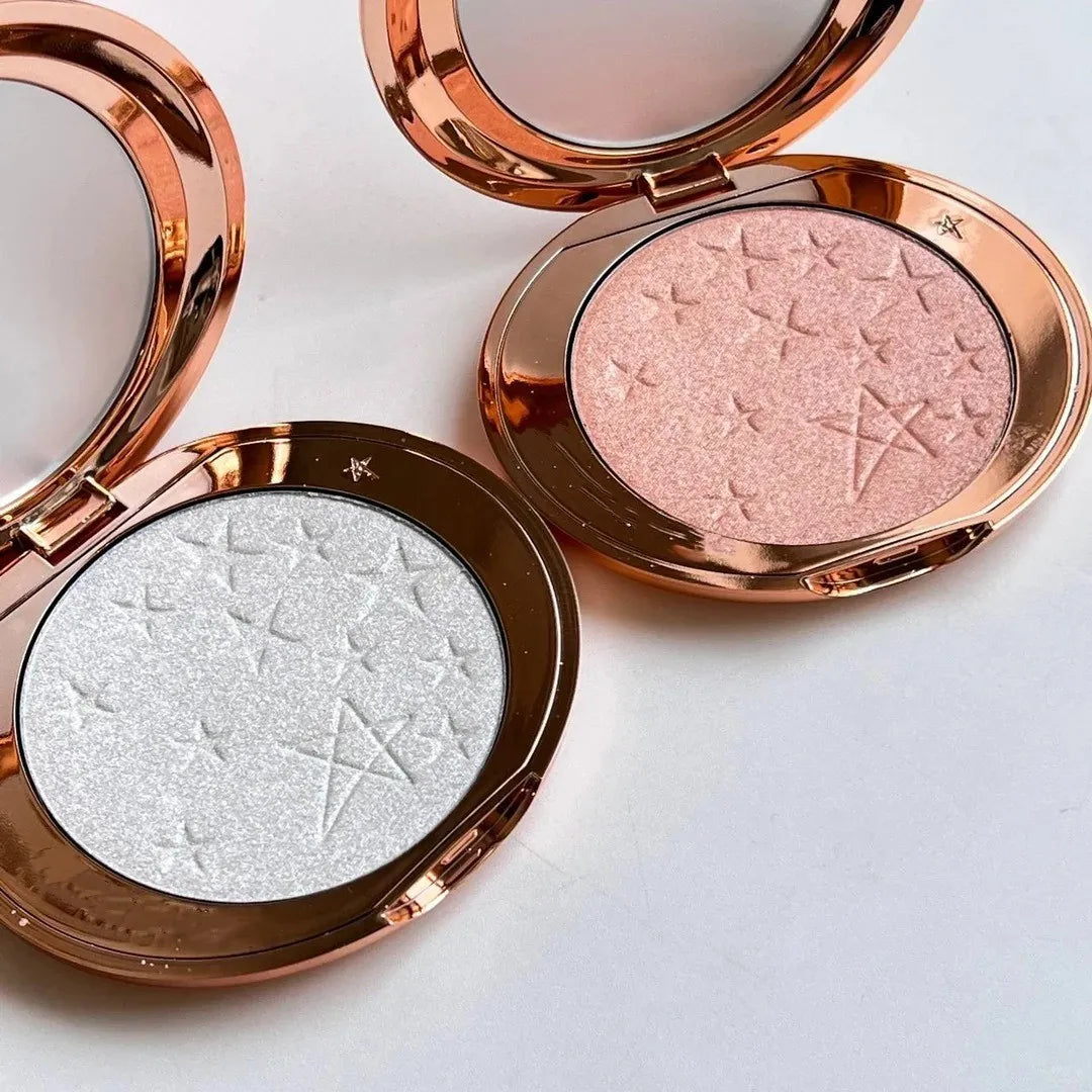 Dual-color pink bronzer highlighter with diamond finish in compact packaging