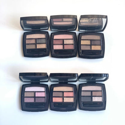 Close-up view of eyeshadow pans showing shimmer and matte finishes