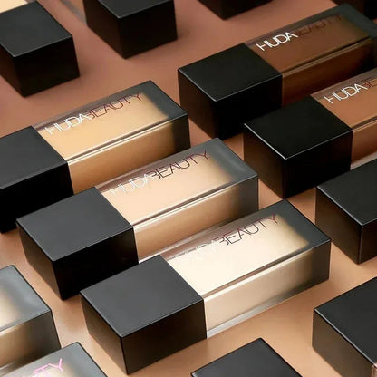 Matte liquid foundation and concealer bottle with applicator
