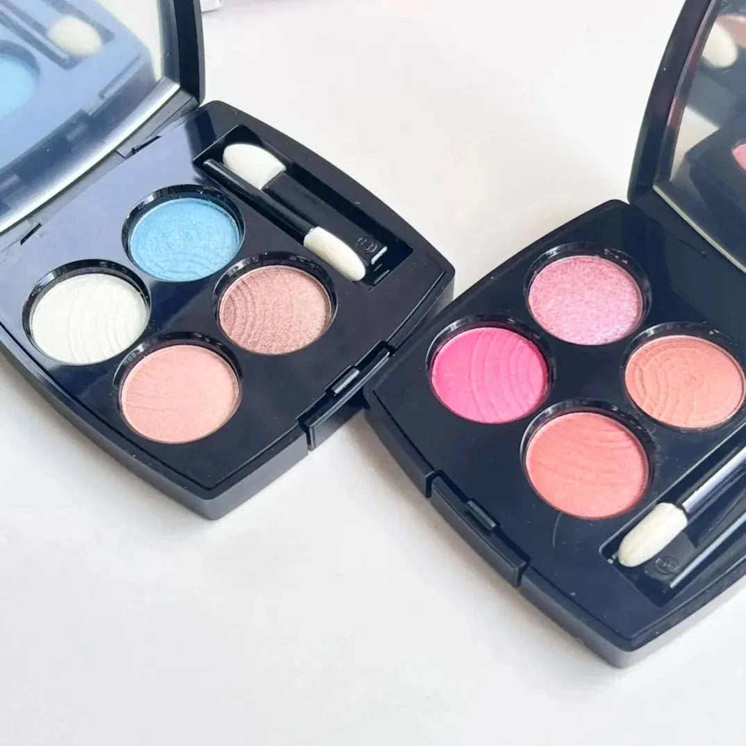 Compact eyeshadow palette showing neutral and vibrant tones