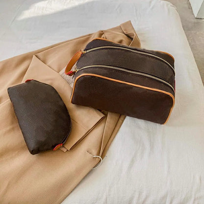 Front view of women's cosmetic bag with zipper closure