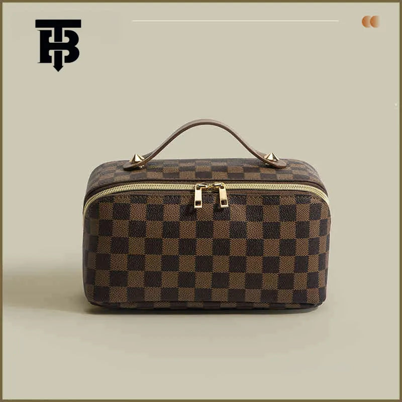 Front view of retro checkered makeup bag showing pattern and handheld strap
