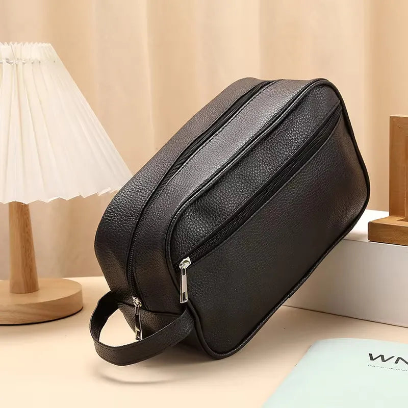 Men's black PU leather toiletry bag with zipper closure