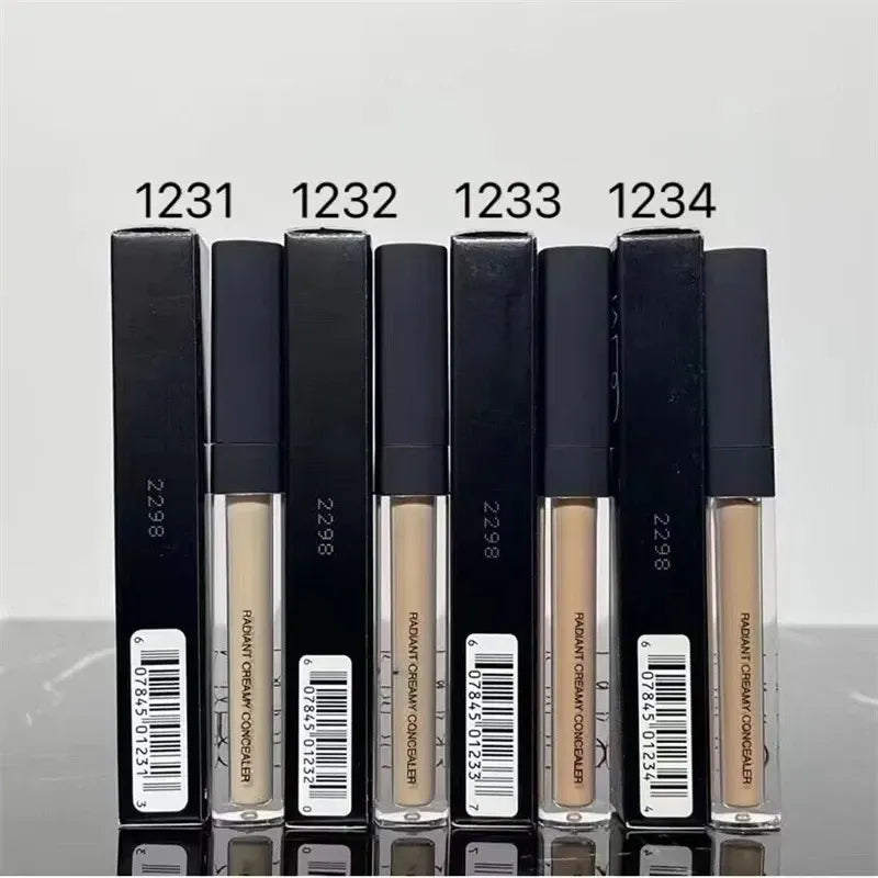 Close-up view of concealer being applied to skin for coverage demonstration