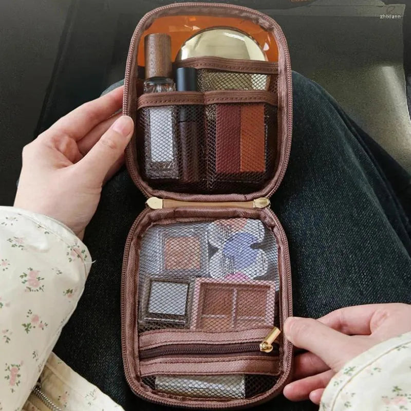 Clear mini travel makeup organizer bag with zipper closure