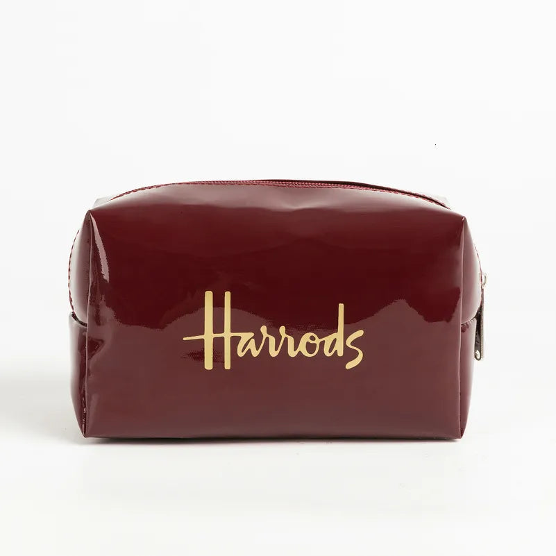 Waterproof nylon cosmetic case with zippered closure and PVC organizers