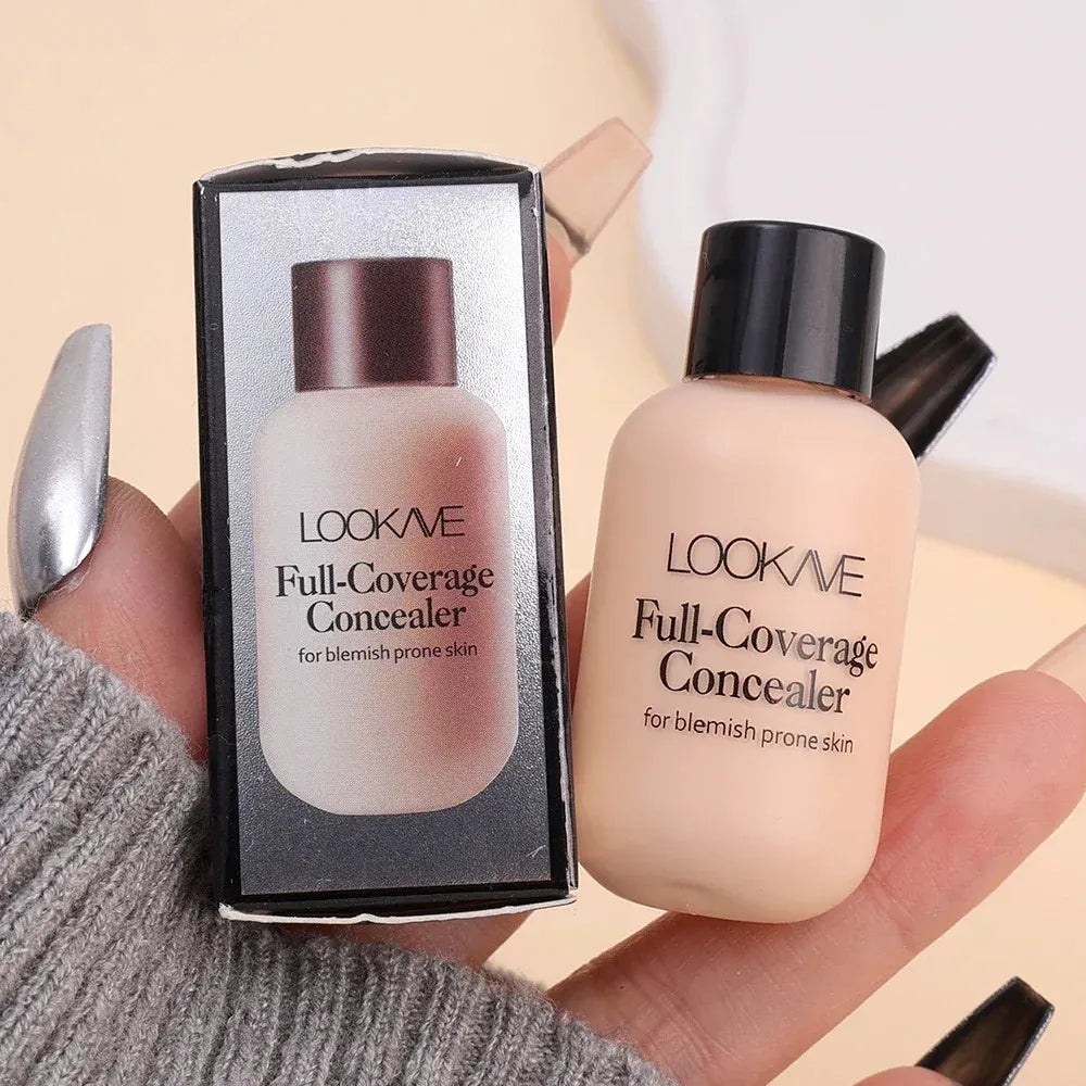 Liquid concealer product in cosmetic packaging with applicator