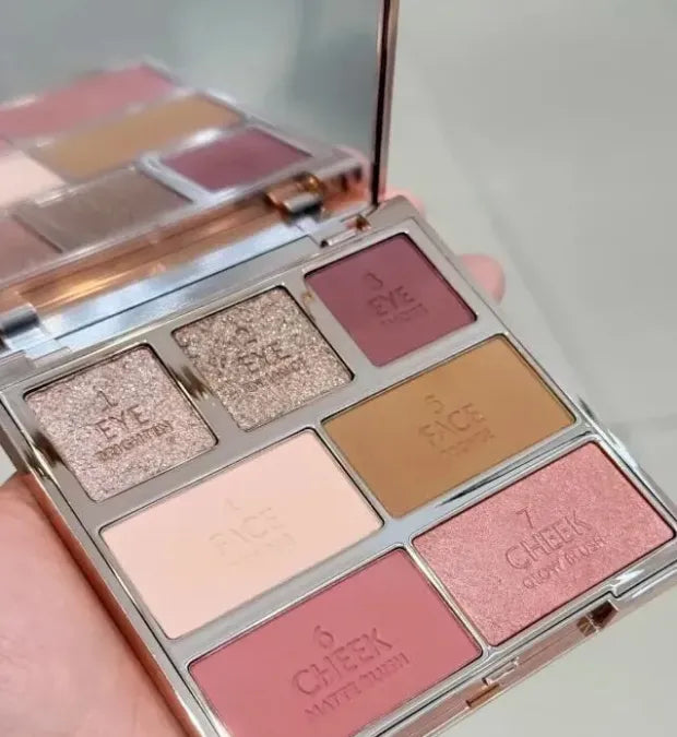 Close-up view of eyeshadow and blush powders in dual-color palette