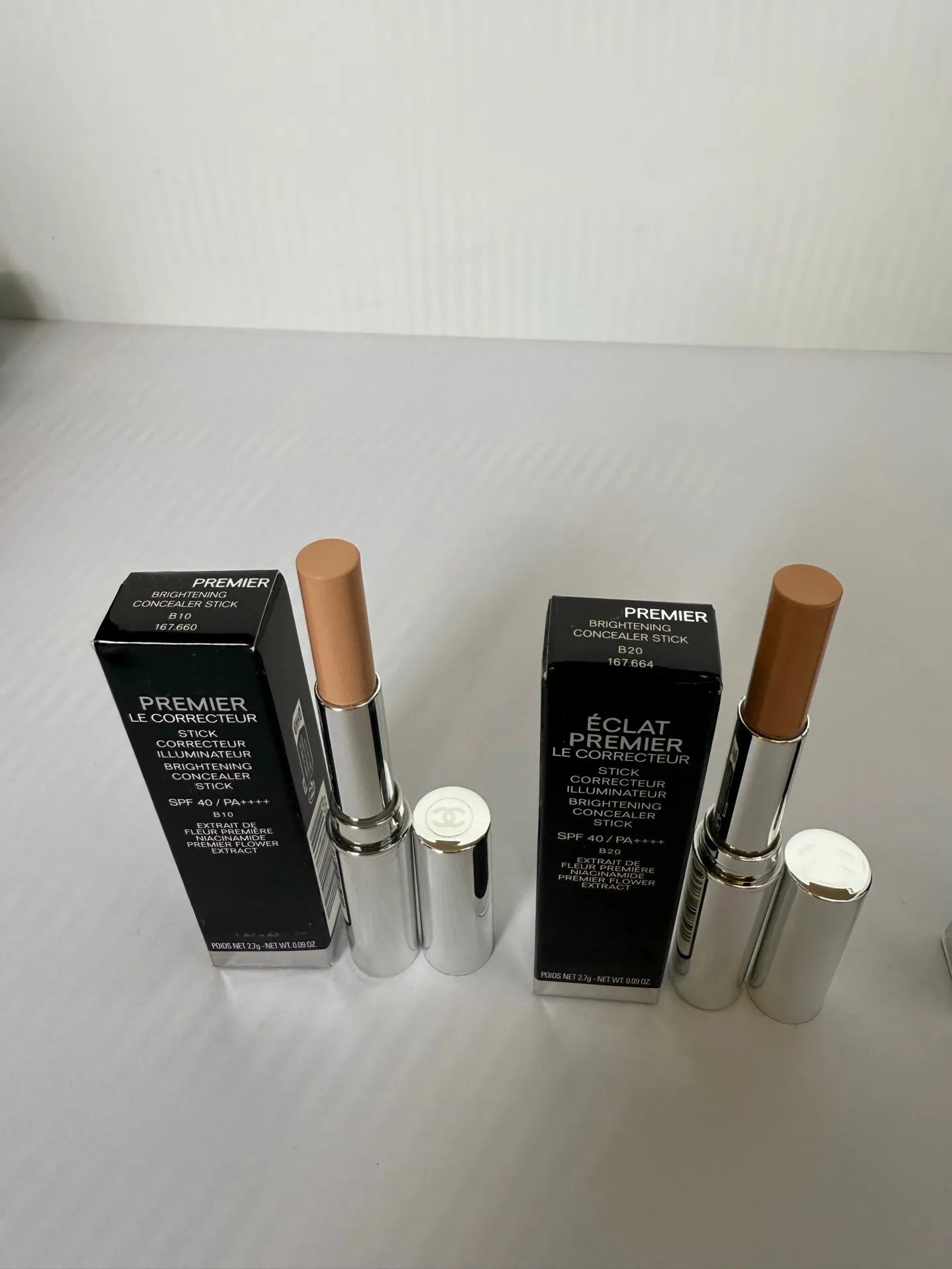 Concealer stick applied to skin showing cream texture and blendability