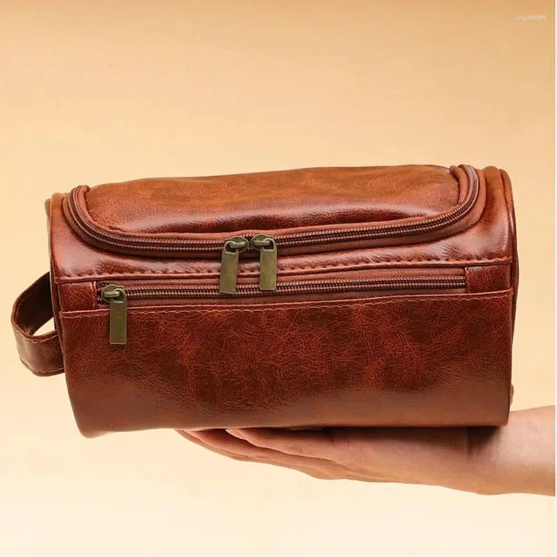 Durable PU leather toiletry bag in black color with hanging hook