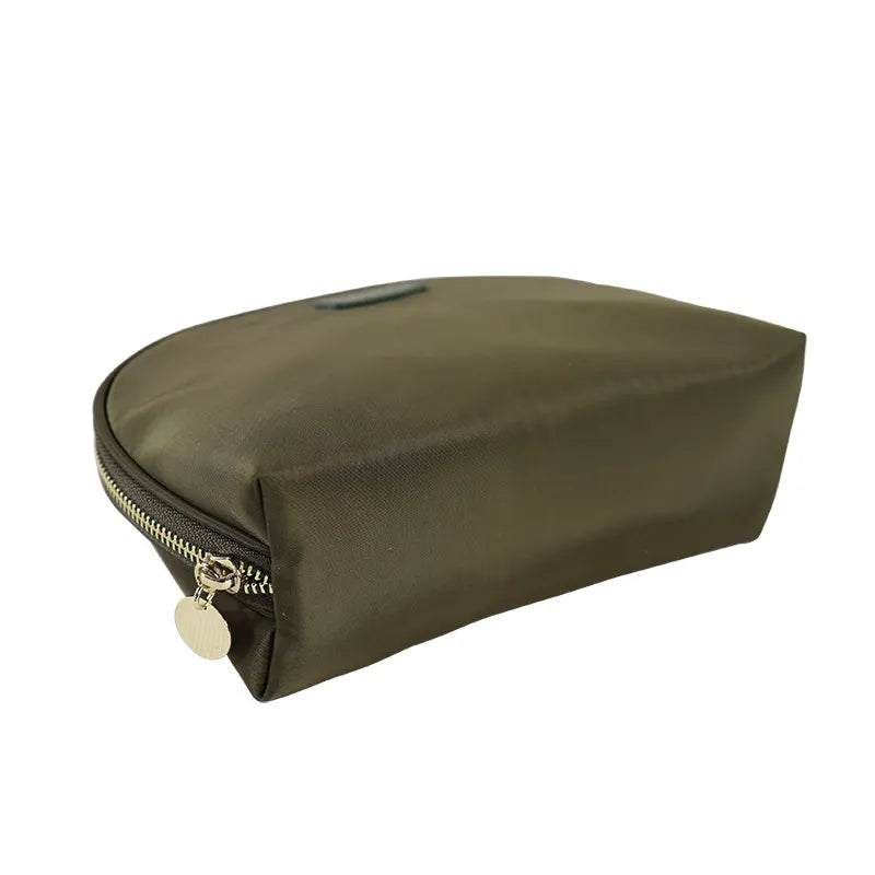 Front view of a minimalist genuine leather coin purse with zipper closure