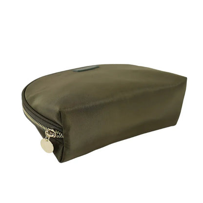 Front view of a minimalist genuine leather coin purse with zipper closure