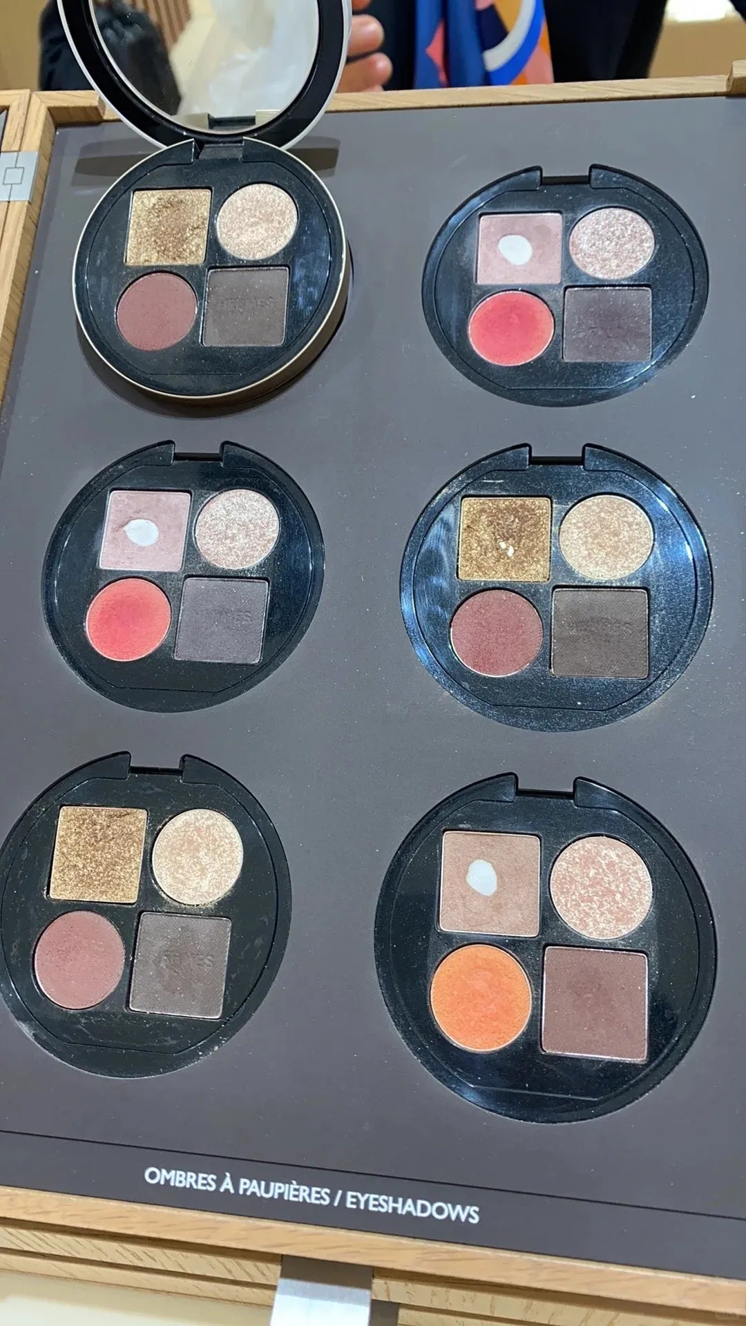 Close-up view of eyeshadow shades showing petal, vegetal, and fauve colors