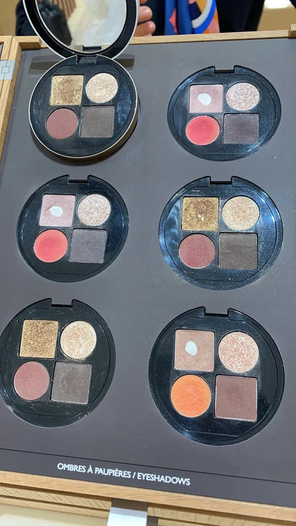 Close-up view of eyeshadow shades showing petal, vegetal, and fauve colors