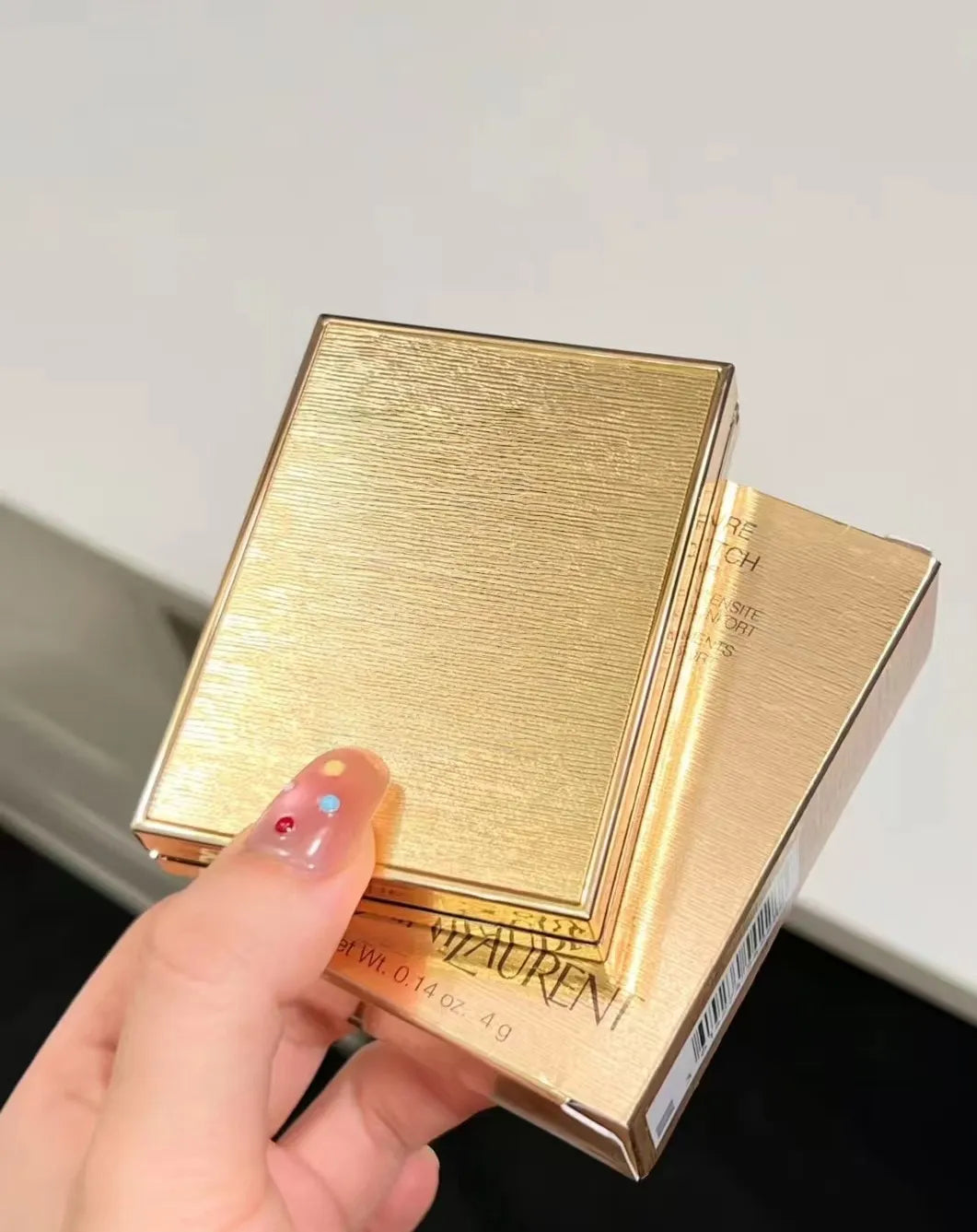 Mini clutch case holding the eyeshadow palette for portability