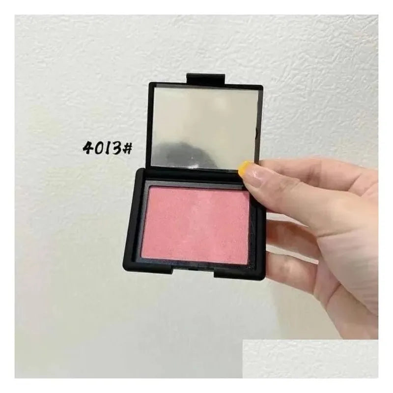 Close-up view of blush shade from the three-color face palette