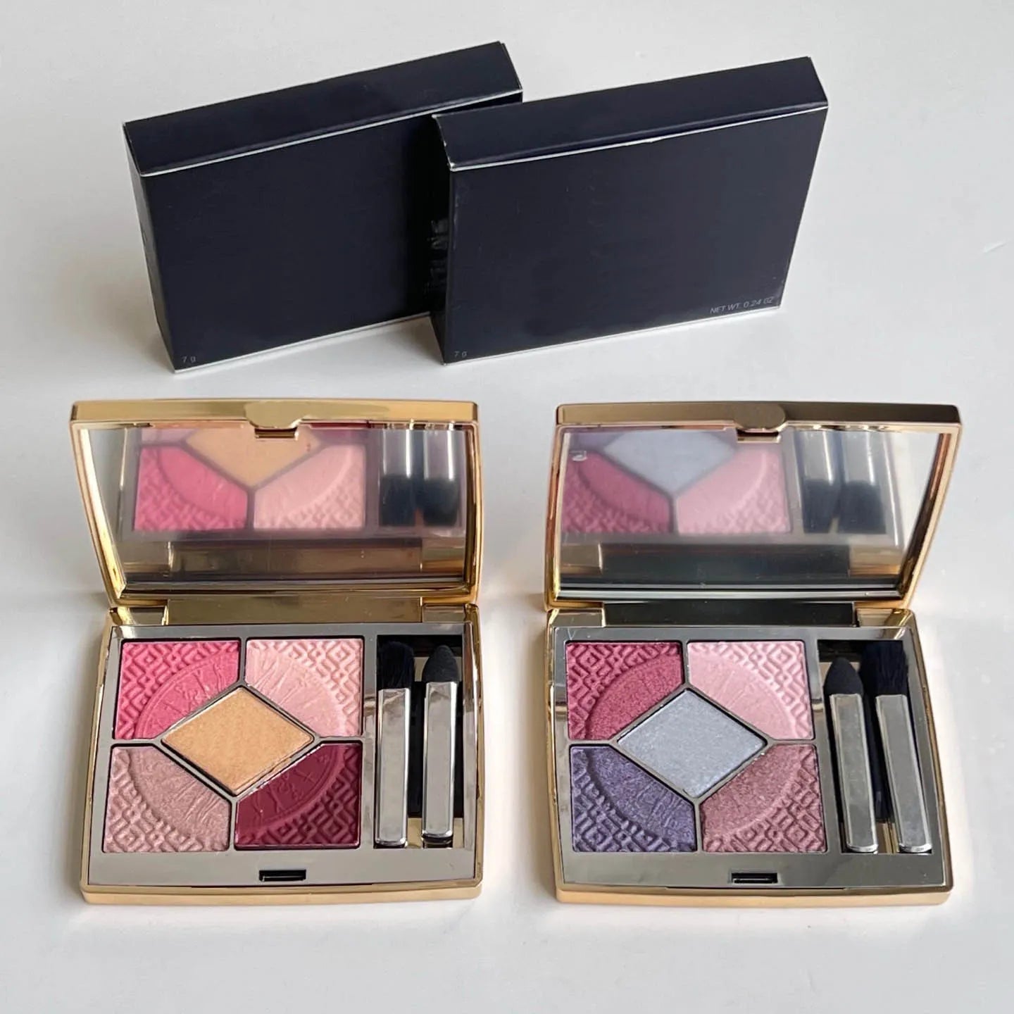 Eyeshadow palette showing color swatches on skin tone