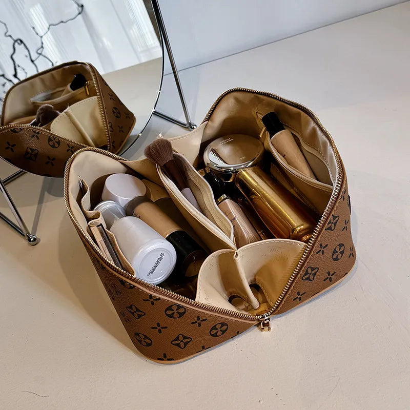 Side perspective of the handheld cosmetic bag showing carrying handle