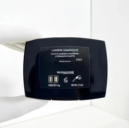 Close-up view of the pressed powder eyeshadow shades showing texture and colors