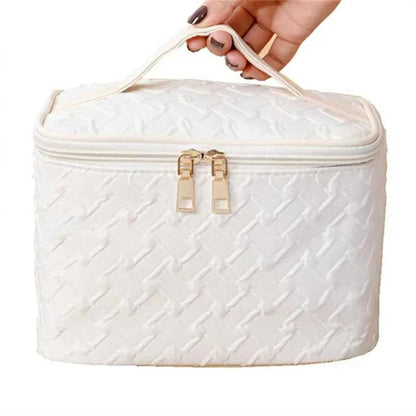 Open interior showing multiple organizer compartments in makeup bag