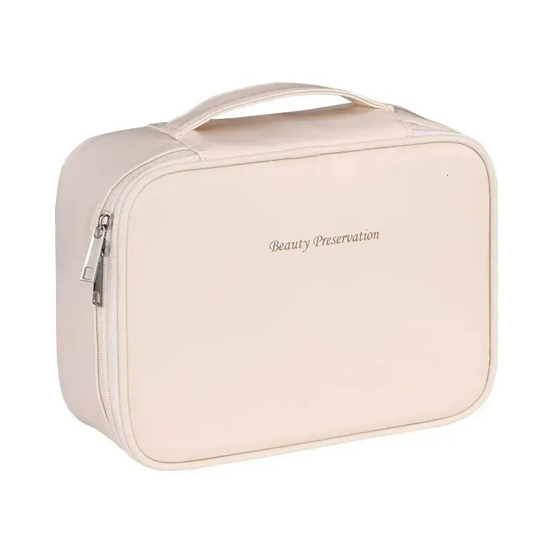 Compact cosmetic tote shown in a neutral color with organized interior compartments