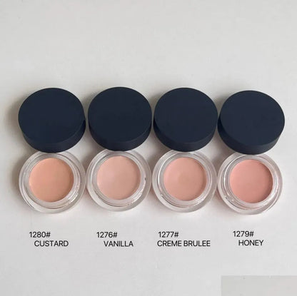 Swatch of concealer cream showing coverage on skin tone