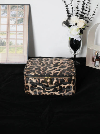 Makeup bag in use with cosmetics arranged inside showing storage capacity