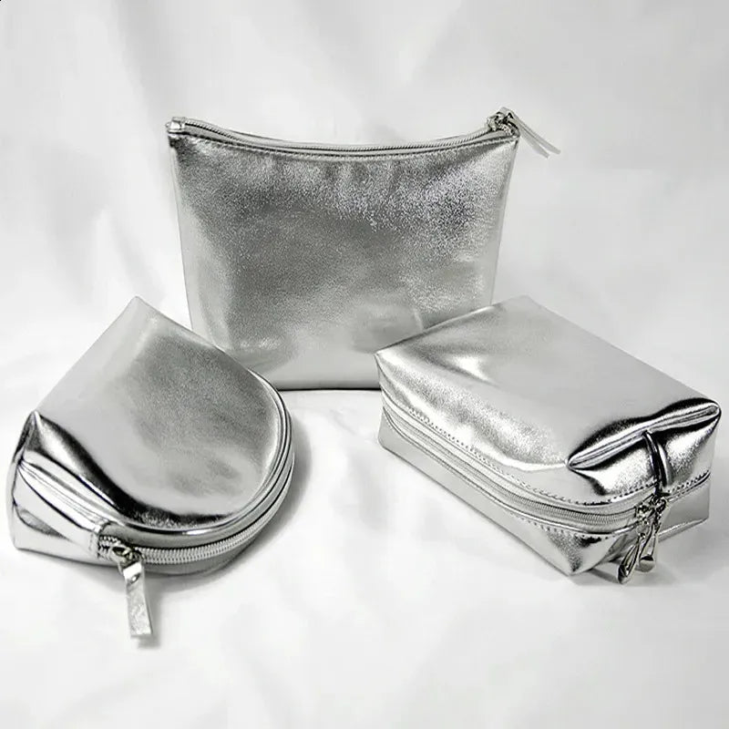 Silver soft leather clutch cosmetic bag with zippered closure