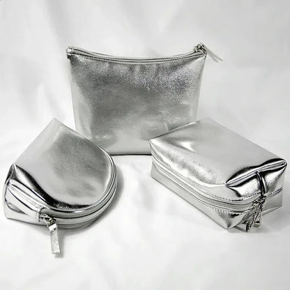 Silver soft leather clutch cosmetic bag with zippered closure