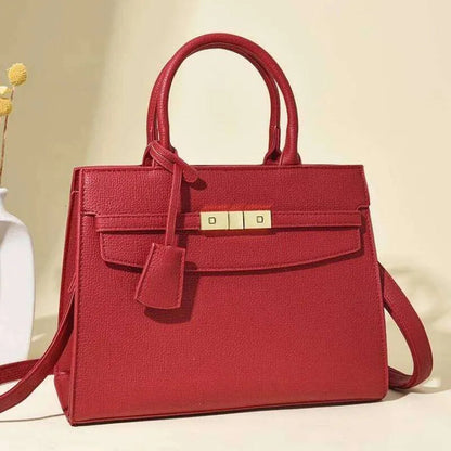 Front view of leather women's shoulder bag showing vintage design